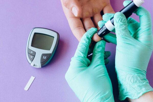 How does metformin lower blood sugar?
