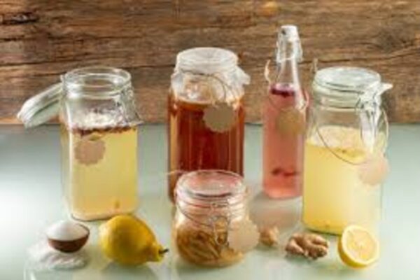 Impact of kombucha, coffee, and turmeric beverages on the color stability of a single-shade versus a multi-shade resin-based composite: Study